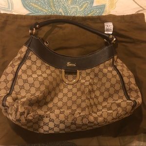 Authentic Gucci D ring canvas monogram hobo bag